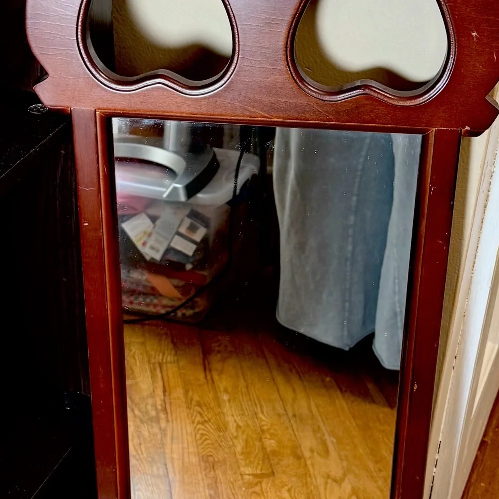 Vintage Dark Finish Wood Frame Mirror with Cut-Out Hearts on Top made by SEI.
